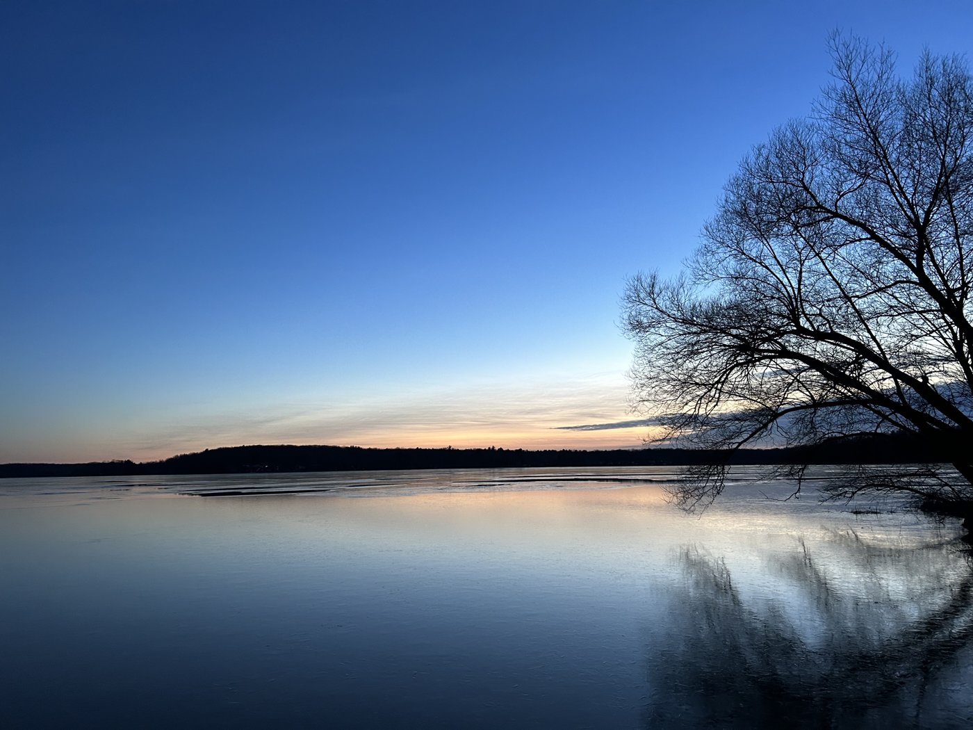 Lake Ann at dusk, seen from Lakefront Park across the water from Maple Grove, Michigan